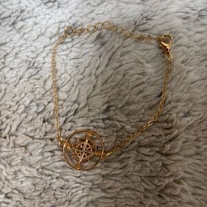 Gold compass bracelet